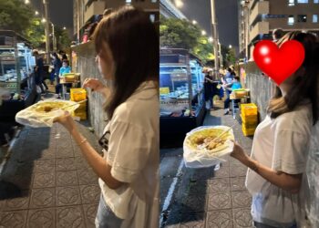 長髮正妹路邊端臭豆腐狂嗑！抬頭竟是「防疫女神」