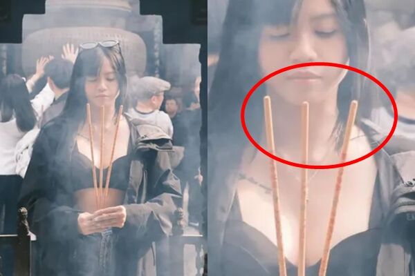 圖／Junee被發現上香拜拜的畫面中，手中的香根本沒點燃。（翻攝自Threads）