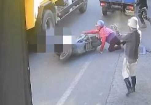 圖／男童未戴安全帽上機車突然暴衝摔落垃圾車底遭輾身亡。（民眾提供）